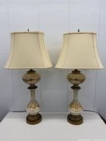 Full view of both matching table lamps with shades