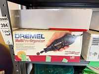 Boxed Dremel MultiPro + Organizer rotary tool on shelf