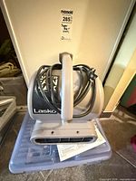 Front view of Lasko air mover showing grille and cord