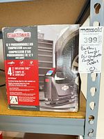 Front of Motomaster 12V programmable air compressor retail box