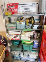 Front view of larger shelving unit filled with bins