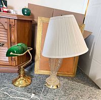 Both lamps side by side: banker lamp with green shade, crystal lamp with pleated shade