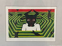 Close view of print showing imagery, edition number 4/35 and signature