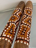 Full view of painted clap sticks