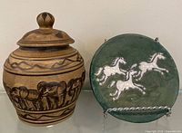 Jar and raku plate side by side