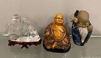 Front view of all three figurines