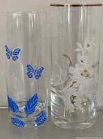 Front view of both vases showing decorative motifs