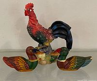 Front view of rooster and two ducks