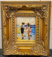 front view of framed painting showing subjects and frame detail