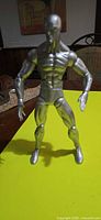 Front view of Silver Surfer figure standing
