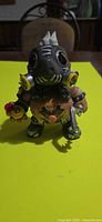 Front view of Funko Pop Roadhog figure showing Wild Hog Power decal and accessories