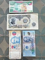 All four banknotes laid out