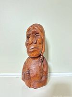 Front view of carved wood bust