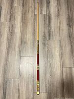 Full view of assembled pool cue