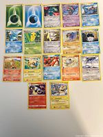 Full set of 17 Pokémon cards laid out