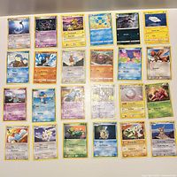 All 24 Pokémon cards laid out in four rows of six