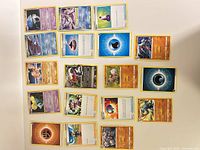 All 18 Pokémon cards laid out face-up for overview