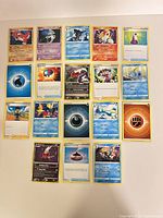 All 18 Pokémon cards laid out in three rows of six