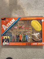 Front view of boxed A-Team Combat Headquarters Set showing contents