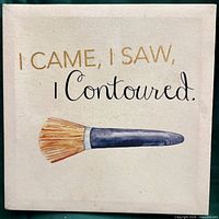 Front view showing text and brush graphic