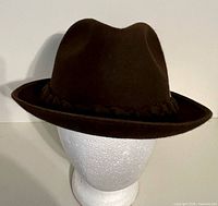 Front view of brown fur felt fedora on stand