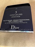 Front of unopened Dior 5 Couleurs Designer box showing weight and branding