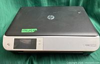 Top view of HP ENVY 5530 printer closed