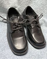 Top view of both shoes showing uppers, laces, condition