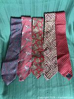 Front view of five neckties laid out