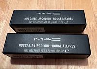 Two black MAC Huggable Lipcolour boxes