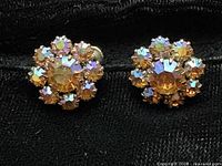 front view of both earrings showing rhinestone clusters