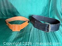 Both belts side by side showing overall color and style contrast