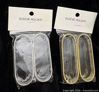 Front view of both sealed packs showing silver and gold sleeve holders