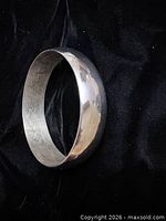 Top view of entire domed silver bangle