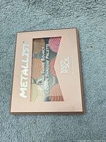 Front of Touch in SOL Metallist palette closed