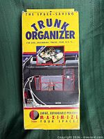Front of boxed trunk organizer showing product image and text