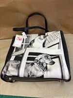 Full view of tote front showing photo print, rhinestones, LIFE tag, handles and metal feet