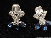 Front view of both earrings showing stone arrangement