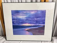 Full view of framed photographic print with mat and frame