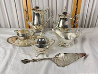 Full view of all seven silver-plated pieces