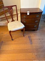 Chest and chair front view