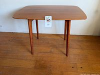 three-quarter view of child-sized wooden table