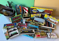 Overview of entire collection showing locomotives, car kits, track, controller and wiring