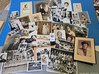 Entire collection spread showing variety of B&W and some colour prints, different subjects and sizes