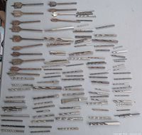 All drill, masonry, spade and tap bits laid out on table