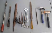 all twelve hand tools laid out