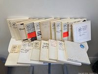 Front view of 18 tape boxes standing and lying flat