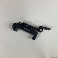 Side view of Arnarkok metal phone mount folded