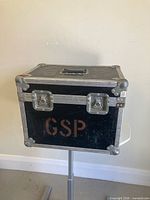 front view of road case showing latches and GSP stencil
