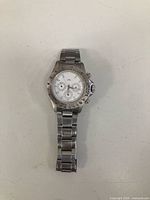 Front view of stainless steel chronograph watch